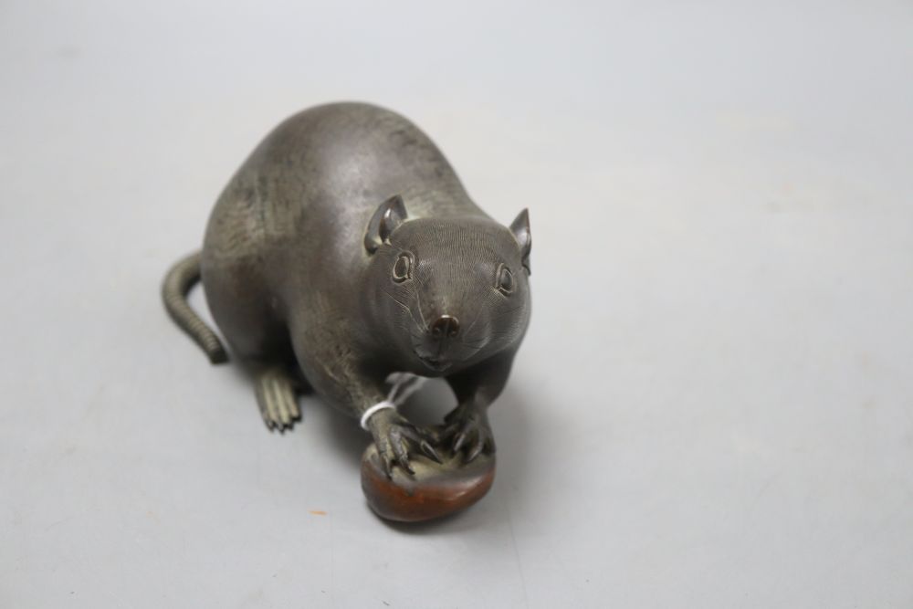 A Japanese bronze rat with acorn, Meiji period, signed, length 18cm